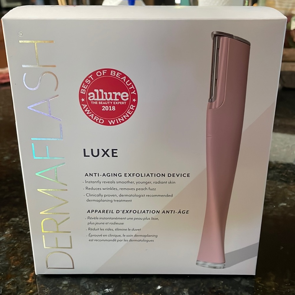 Brand new Derma flash with extra blades retails for $240